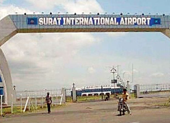 A modern airplane taking off from a runway, symbolizing Surat new international airport status.